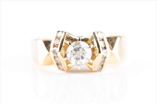 Lot 393 - A yellow metal and diamond ring in the late...