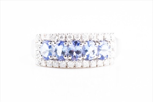 Lot 604 - A 9ct white gold, diamond, and tanzanite ring...