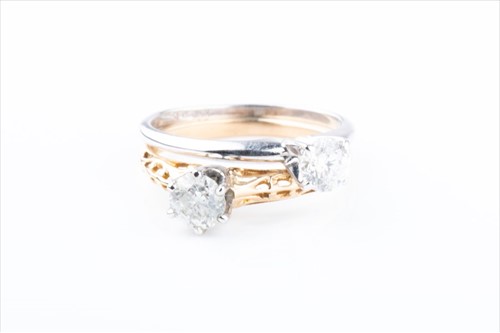 Lot 437 - A diamond solitaire ring the round...