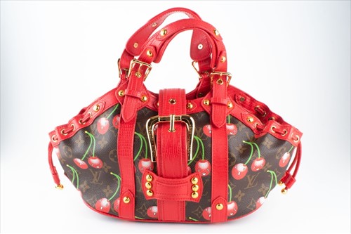 Lot 184 - A Louis Vuitton cherry pattern Theda bag from...