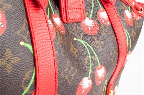 Lot 184 - A Louis Vuitton cherry pattern Theda bag from...