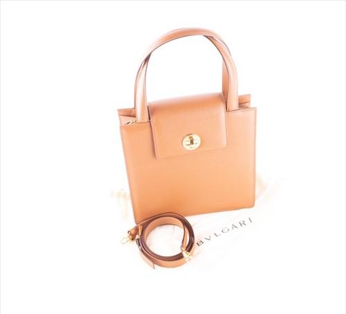 Lot 258 - A Bulgari handbag of squared form, with logo...
