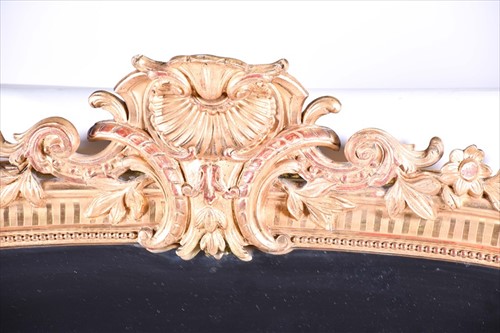Lot 68 - A 19th century gilt gesso and wood overmantle...