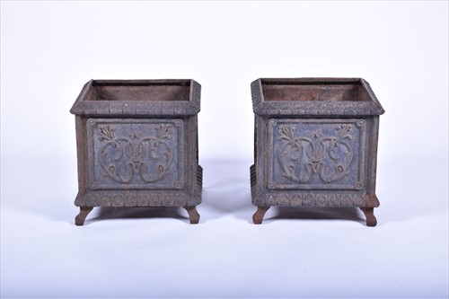 Lot 62 - A pair of 20th century cast iron planters of...