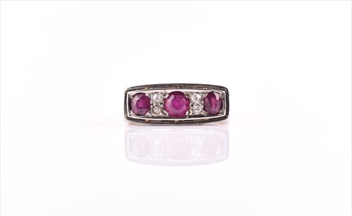 Lot 500 - A 14ct yellow gold, diamond, and ruby ring the...