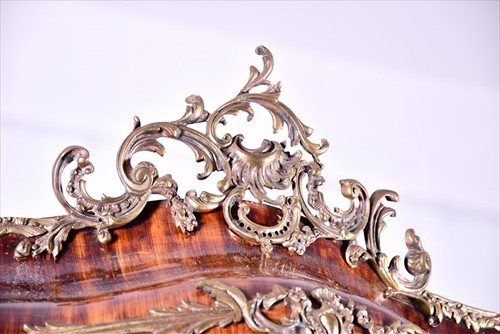 Lot 12 - A large Louis XV style serpentine front...