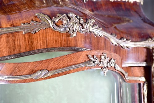 Lot 12 - A large Louis XV style serpentine front...