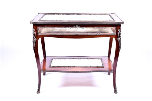 Lot 15 - An early 20th century French Kingwood and gilt...