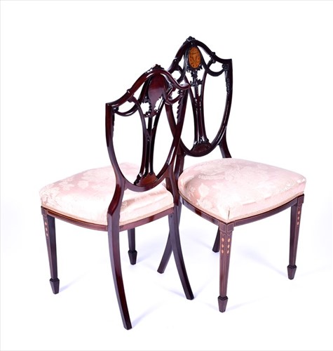 Lot 46 - A set of four Edwardian mahogany dining chairs...