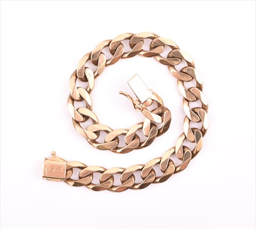 Lot 697 - A 9ct yellow gold flattened...