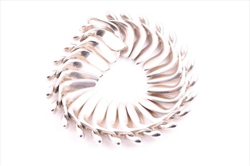 Lot 696 - George Jensen. A rare sycamore pod silver...
