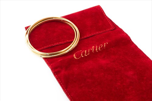 Lot 362 - Cartier. An 18ct yellow gold and diamond...