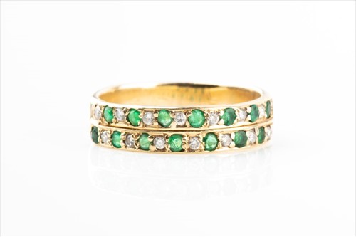 Lot 408 - A yellow metal, diamond, and emerald ring the...