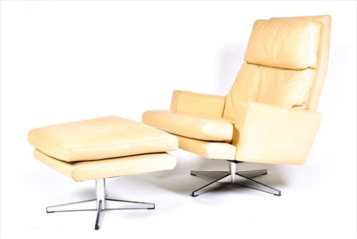 Lot 56 - A 1970s mushroom leather upholstered swivel...