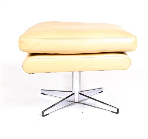 Lot 56 - A 1970s mushroom leather upholstered swivel...