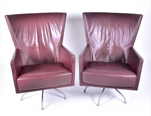Lot 28 - A pair of mid century design leather swivel...