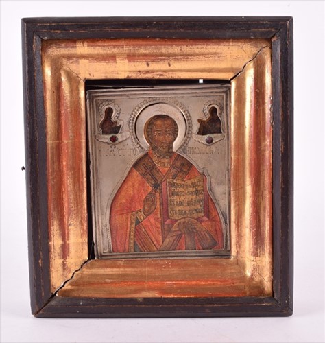 Lot 258 - A turn of the century Russian icon depicting...