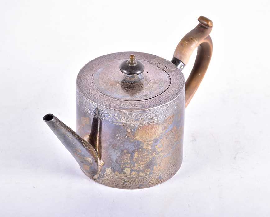 Lot 452 - A George III small silver teapot London 1797,...