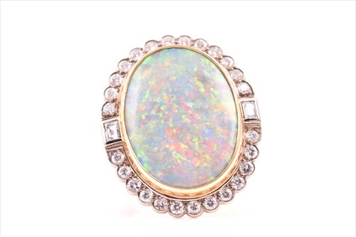Lot 490 - An 18ct yellow gold, diamond, and doublet opal...