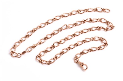 Lot 668 - A 9ct rose gold flattened figaro link chain...