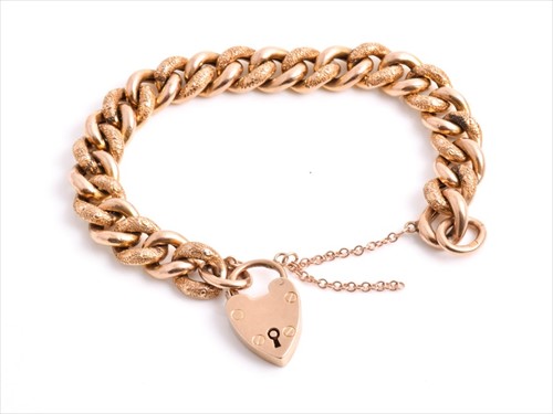 Lot 721 - A Victorian 9ct gold hollow curb-link...