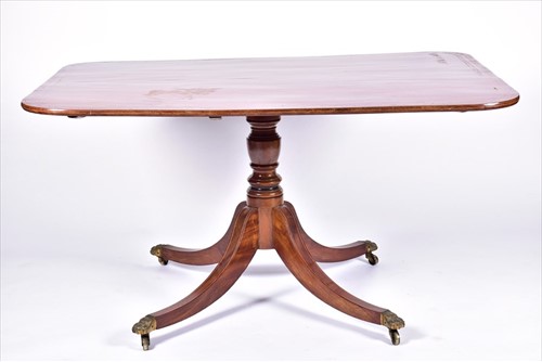 Lot 52 - A Victorian mahogany tilt top dining table the...