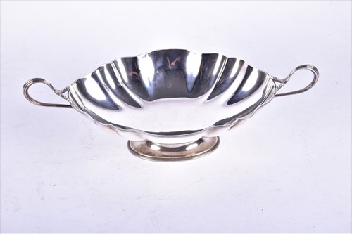 Lot 436 - A George V twin-handled silver pedestal bowl...