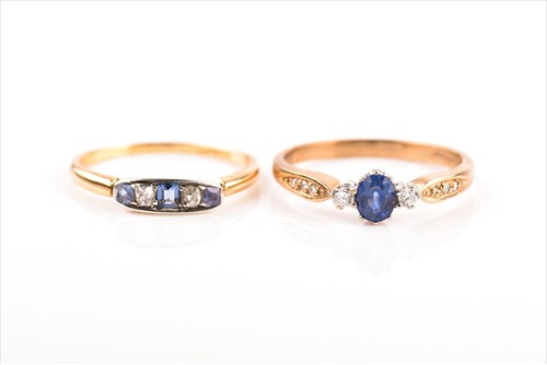 Lot 455 - A 9ct yellow gold, diamond and sapphire ring...