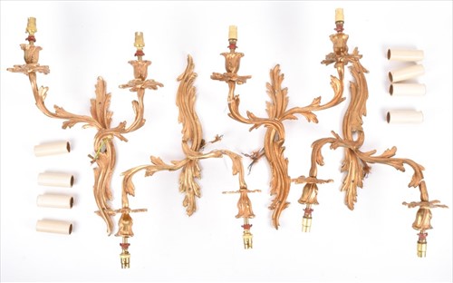 Lot 263 - A set of four Louis XV style acanthus twin...