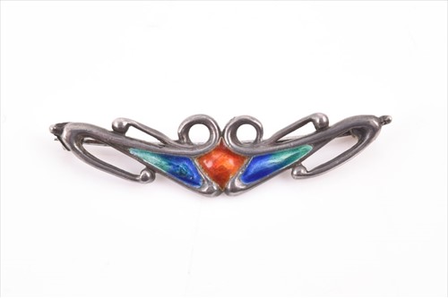 Lot 620 - A Cymric silver and enamel brooch for Liberty...