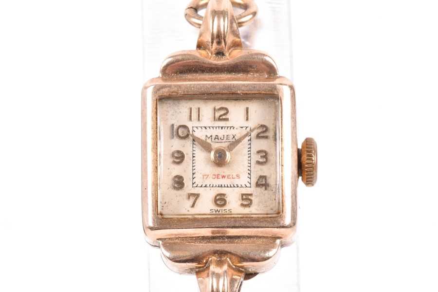 Lot 405 A yellow metal ladies cocktail watch with