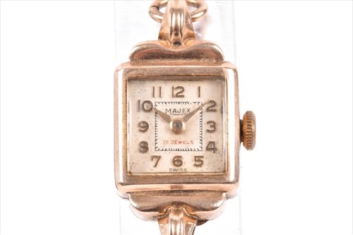 Lot 405 - A yellow metal ladies cocktail watch with...