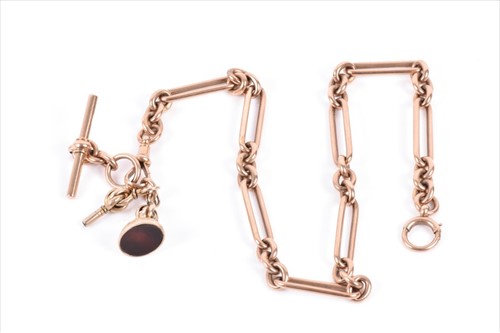 Lot 596 - A 9ct rose gold Albert chain / necklace...