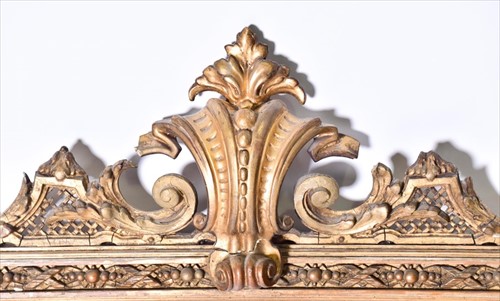 Lot 38 - A large Victorian gilt-wood over mantle mirror...