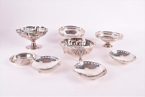 Lot 464 - Four early 20th century English silver footed...
