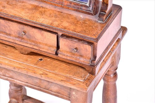 Lot 6 - A 19th century walnut dressing table mirror...