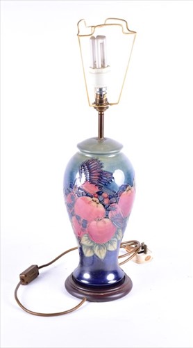Lot 191 - A Moorcroft baluster table lamp in the...