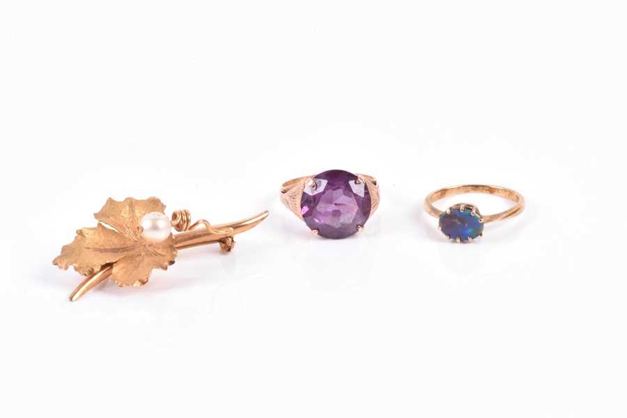 Lot 589 - An Egyptian yellow gold and synthetic corundum...