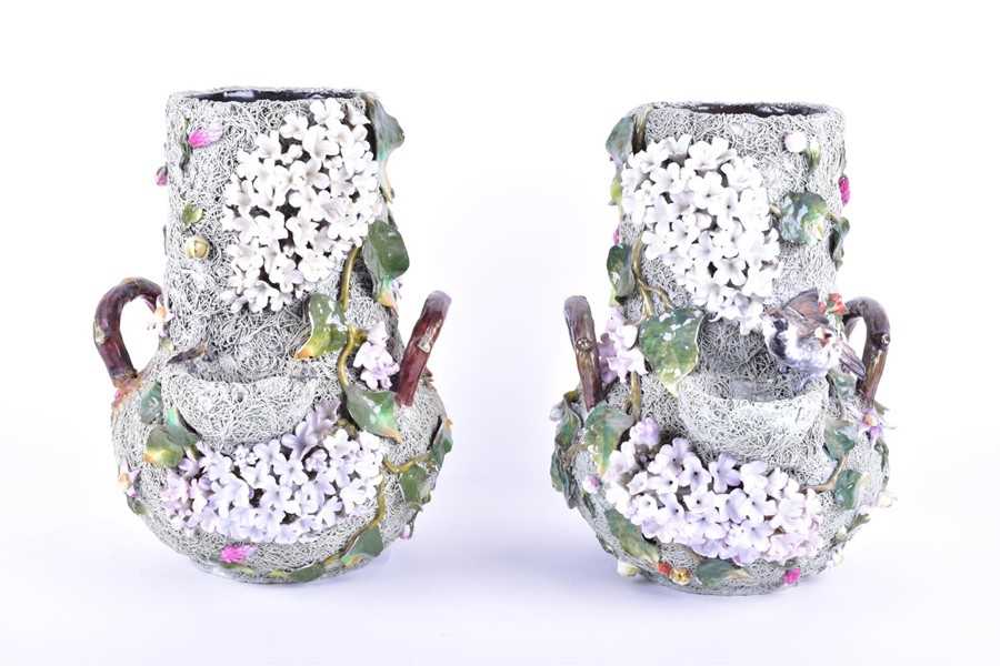 Lot 193 - A pair of large Portuguese Palissy style vases...
