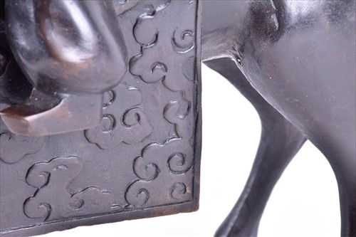 Lot 150 - A 20th century bronze figure of a horse and...