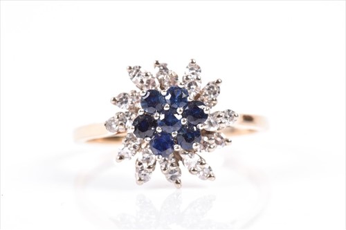 Lot 579 - A 14ct yellow gold, diamond, and sapphire...