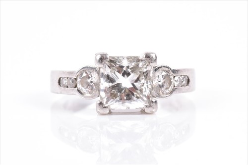 Lot 576 - A platinum and diamond ring set with a...