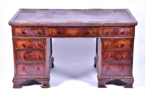 Lot 15 - An Edwardian mahogany nine drawer pedestal...