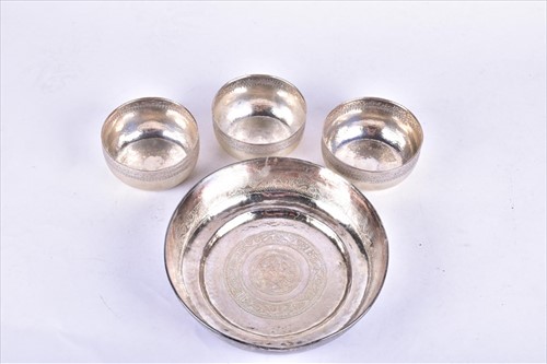 Lot 472 - An Eastern white metal circular bowl with...