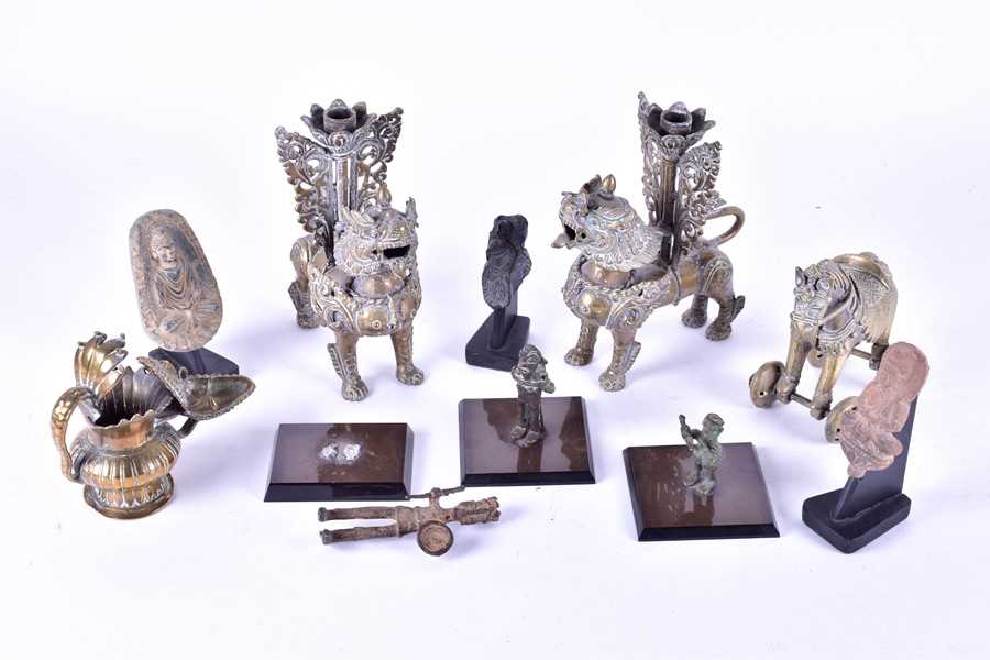 Lot 161 - A collection of antique Indian brass ware...