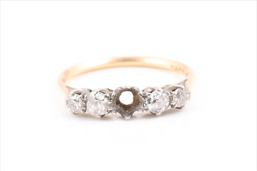 Lot 126 - An 18ct yellow gold and diamond ring set with...