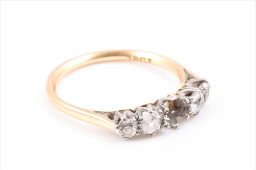 Lot 126 - An 18ct yellow gold and diamond ring set with...