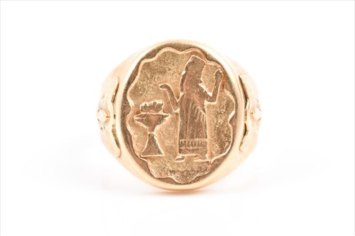 Lot 558 - An unusual 18ct yellow gold ring the oval...