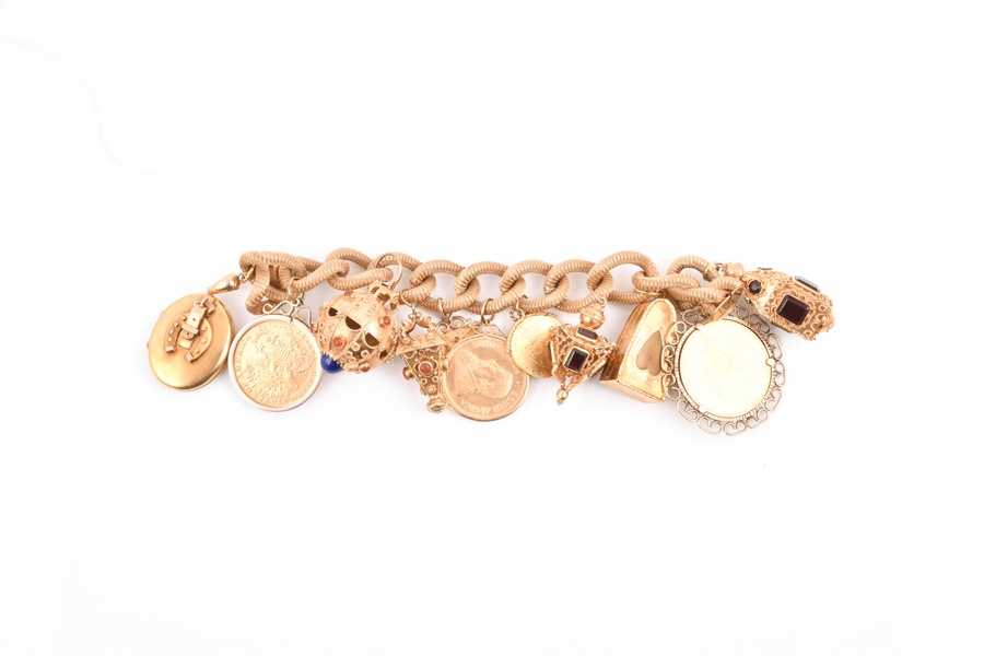 Lot 488 - A fine and impressive yellow gold charm...