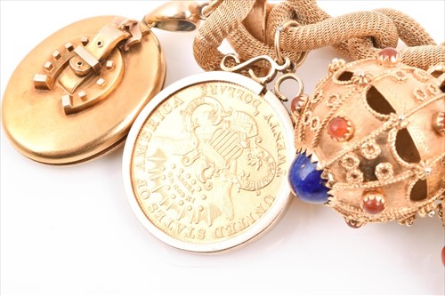 Lot 488 - A fine and impressive yellow gold charm...
